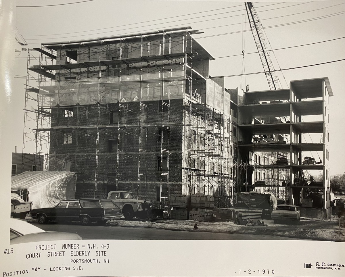 Historic view of the apartment building being built