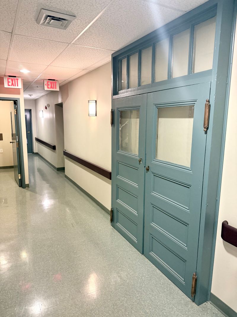Apartment hallway with decorative antique doors