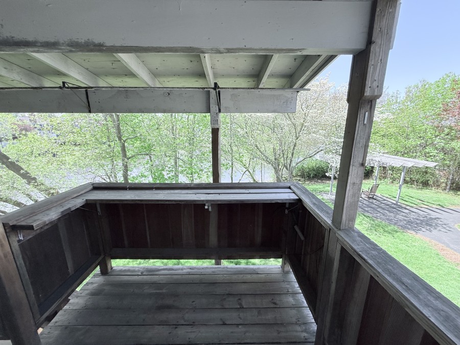 Wood patio looking into backyard